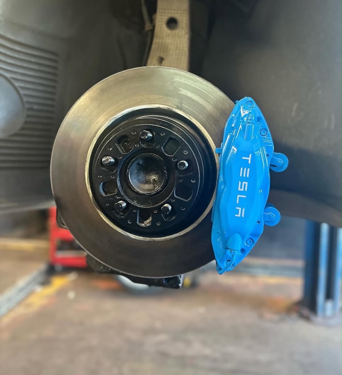 Blue painted Tesla caliper