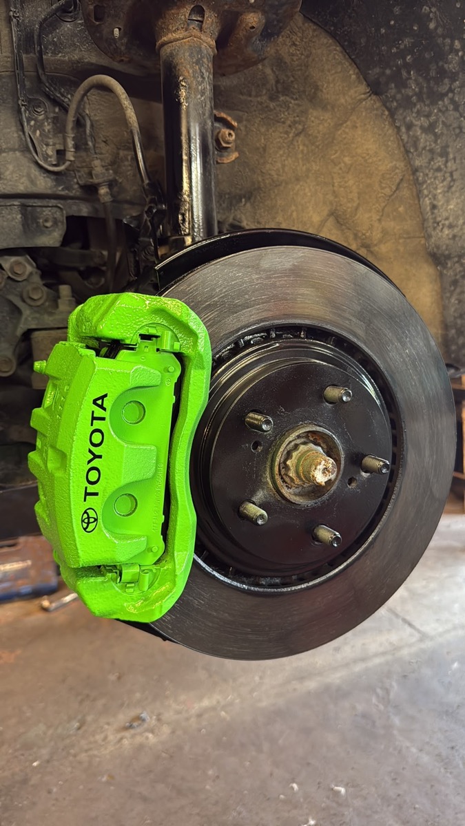 Green painted Toyota caliper