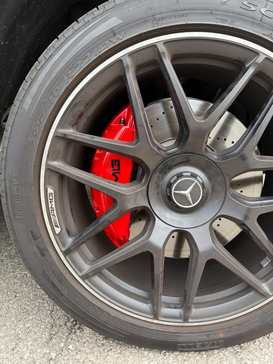Red painted AMG brake caliper on Mercedes wheel